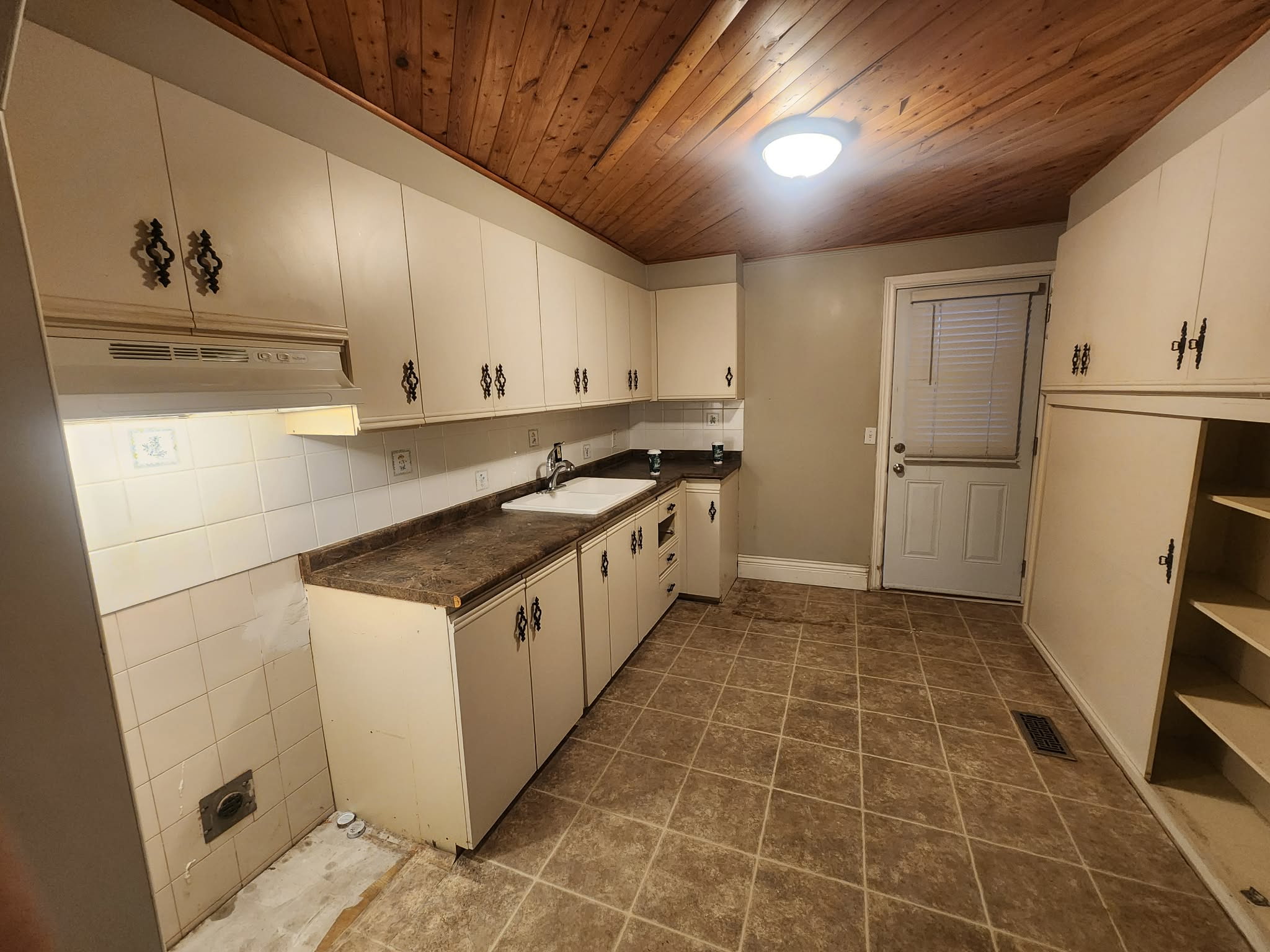 Dated 70s Kitchen with Wood Ceiling - Before